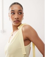 wrap front tank top with bow shoulder in buttermilk yellow