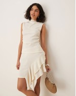 textured grown on neck top and skirt with frill detail co ord in ecru
