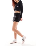 low rise wrap skort with tie detail in black