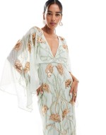 cape midi dress with floral embellishment in sage green
